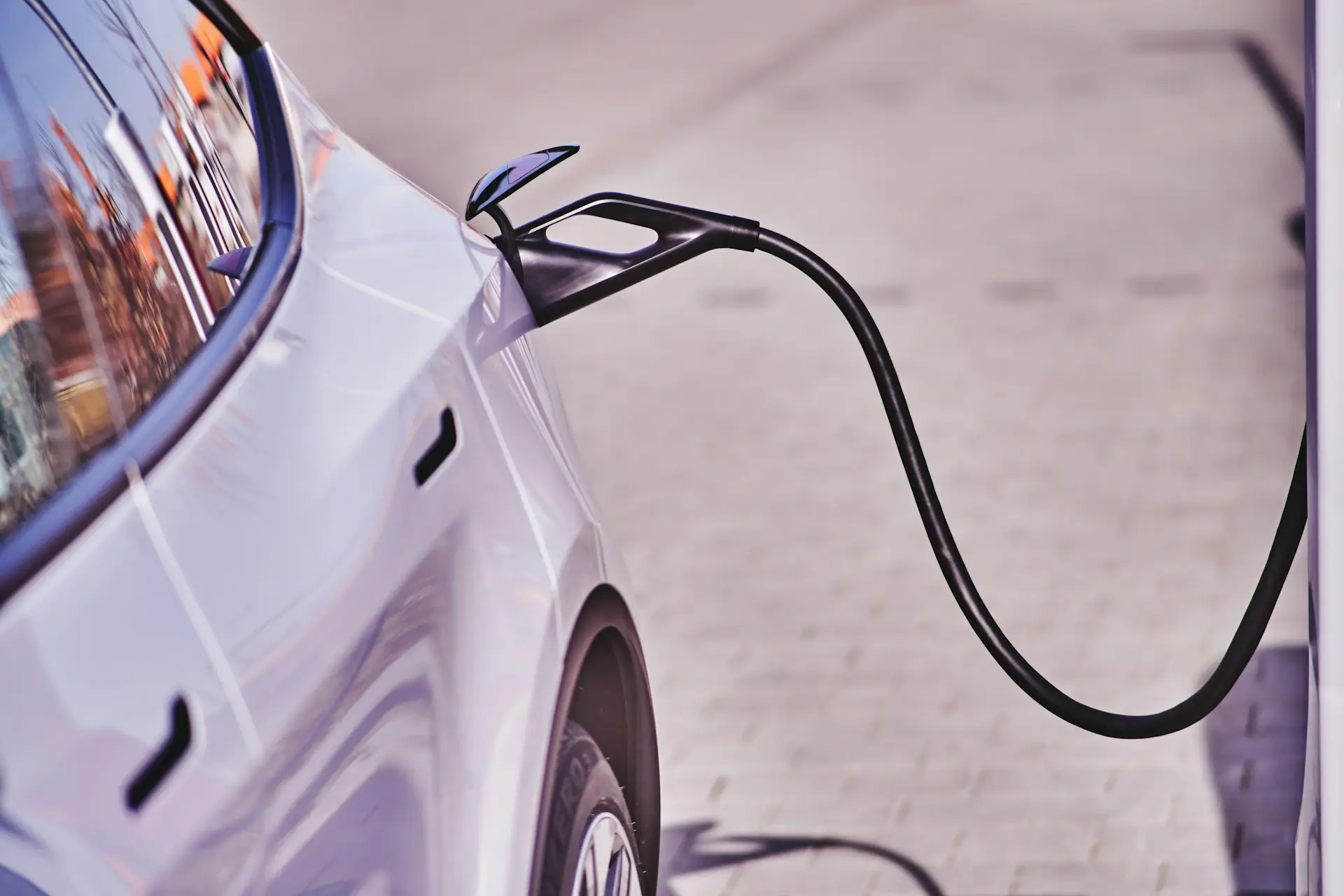 EV plugged into electric vehicle charger for smart charging